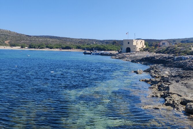 2 hour Private Boat Adventure Tour of Comino and Blue Lagoon - Stop 3: Crystal Lagoon under cliffs and caves, with Saint Mary Tower nearby