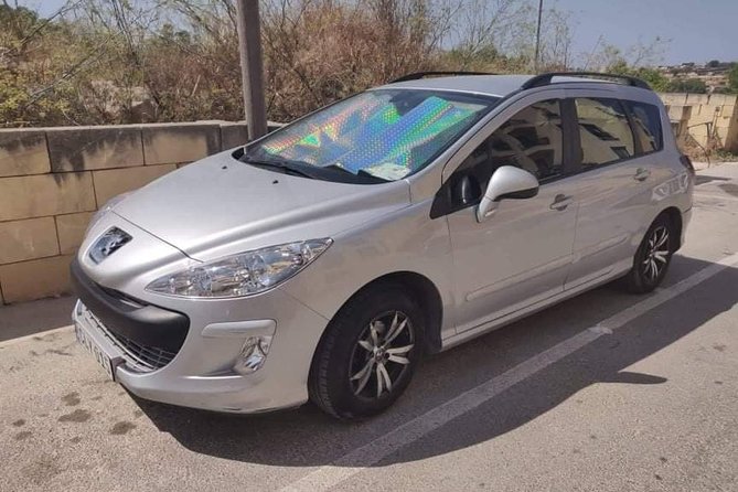 Airport Transfers (Private) - Meeting your driver at Malta International Airport, sign and quick pickup