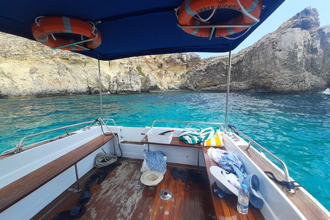 Boat Charters Blue lagoon, Crystal Lagoon, Comino, Malta 4hr trip - San Niklaw Bay, and the payoff of ending on a calmer mood