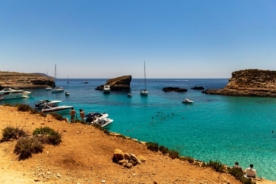 Bugibba: Scenic Sunset Cruise with Blue Lagoon Swim Stop - Cruising North With Chill Reggae Through the Maltese Water