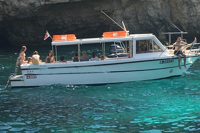 Comino and Gozo Private Boat Tour : Julie Pearl Boat - Blue Lagoon on Comino: your best chance at clear-water swimming