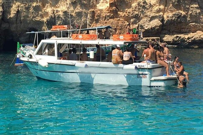 Comino and Gozo Private Boat Tour : Julie Pearl Boat - Santa Marija Bay: the calmer Comino swim option plus shade