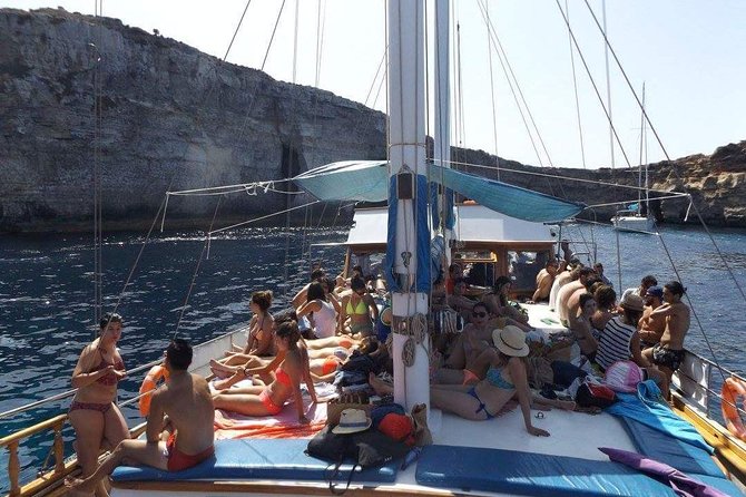 Comino, Blue Lagoon and Caves. Tour A - The Morning Cruise: Shipwrecks, Beaches, and Mellieha Views