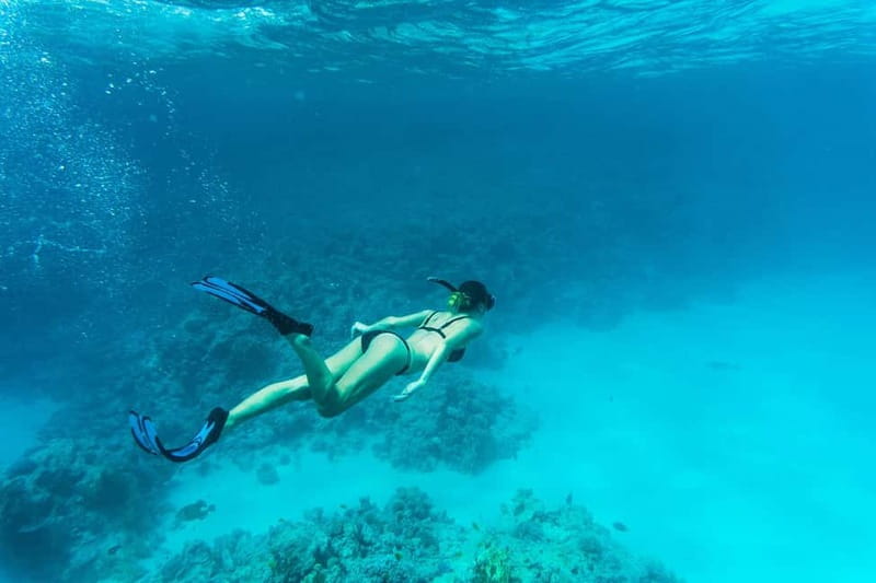 Comino: Blue Lagoon, Crystal Lagoon and Sea Caves Boat Tour - Halfa Rock, Promising Rock, and the scenic passes that frame the day