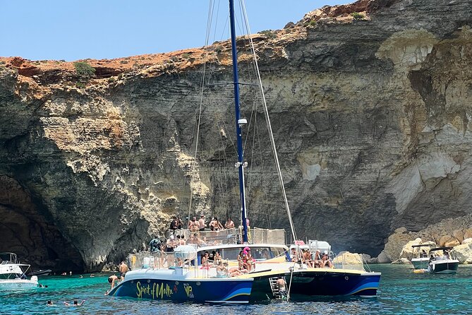 Comino Blue Lagoon Prime Catamaran Tour with All Inclusive - Comfort, Music, and Crew Vibe on a Boat Up to 80