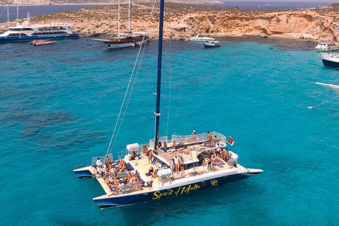 Comino Blue Lagoon Prime Catamaran Tour with All Inclusive - Comino Stop: Bays, Snorkeling Time, and the Blue Lagoon If Weather Allows
