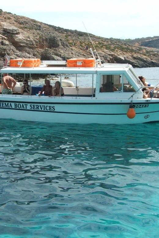 Comino: Private Boat Trips, Swimming stops and Caves Tours - Lucky Lady boat setup: shade, rooftop sun, shower, and Bluetooth music