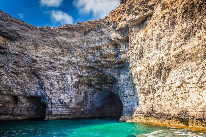 Explore Comino, Blue Lagoon & Caves - Private speed boat - Half Rock and scenic passes: a quick window into Gozo’s coast
