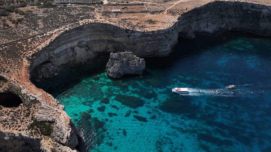 Ferry service to Blue Lagoon (opt. stop in Gozo)& Caves trip - Complimentary Caves Trip: Better Views from the Sea