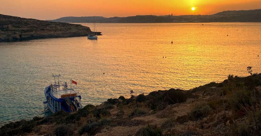 From Bugibba: Blue Lagoon Sunset Cruise - The 1-Hour Sightseeing Cruise: Northbound Views on the Way to Comino