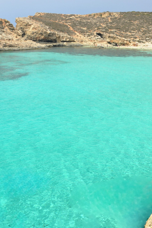 From Malta/Gozo: Comino & Crystal Lagoon Private Boat Trip - Life on board: shade, cold drinks, Bluetooth music, and Wi-Fi