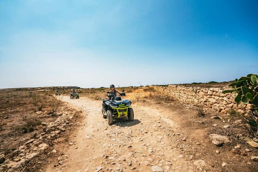 From Malta: Gozo & Comino Quad Bike & Boat Tour with Lunch - Comino caves by private boat, plus the Blue Lagoon swim timing
