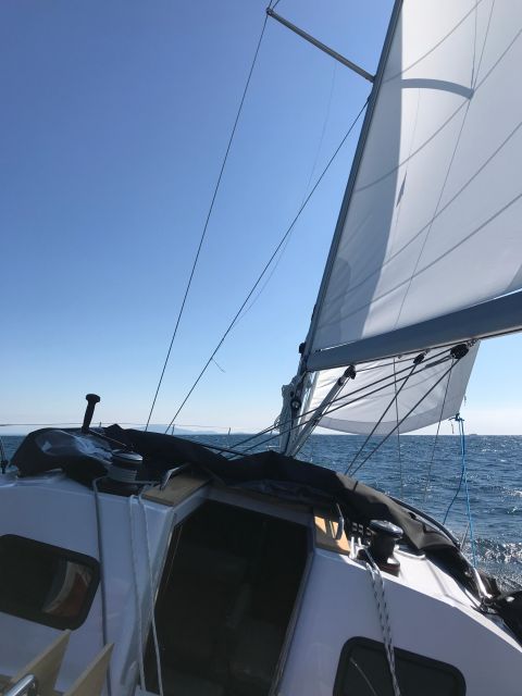 From Valletta: Full Day Private Charter on a Sailing Yacht - Armier Bay Beach: where the day gets a little softer