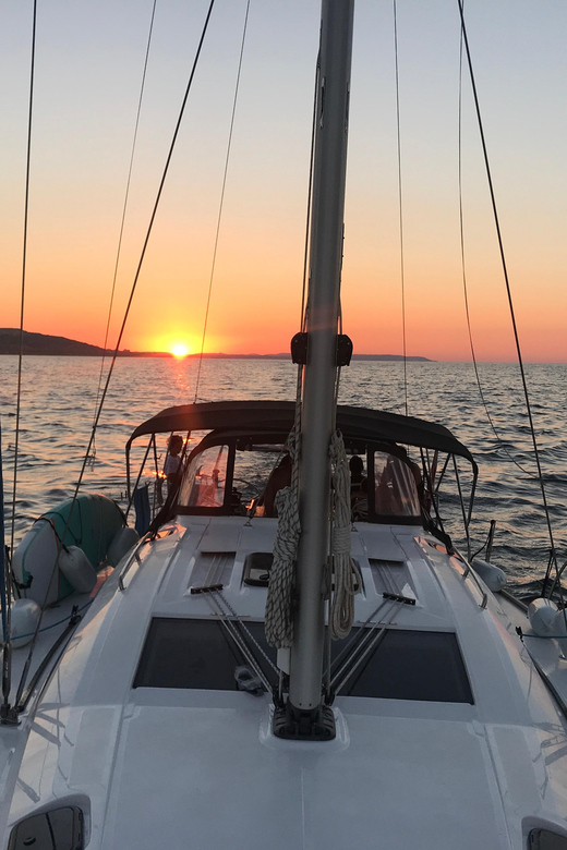 From Valletta: Romantic Sunset Cruise on a Sailing Yacht - Open sea sunset time, then anchoring for the best kind of calm