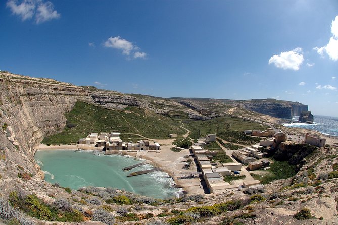 Gozo island guided day tour from Malta - Stop 3: Xlendi Beach, cliff viewpoints, and caves
