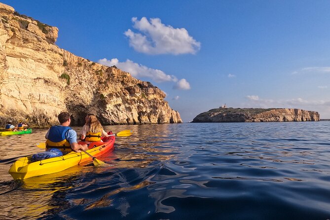 Guided Kayak Tour in St Paul's Island - Stop 1: Mistra Bay Beach, hills, and the military battery vibe