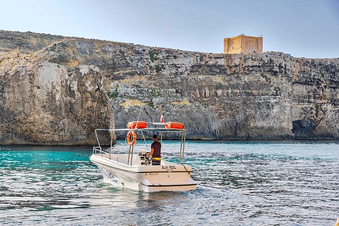 Half Day Blue Lagoon, Comino and Gozo Private Guided Boat Cruise - Halfa Rock in Qala, Gozo: A Pirate-Legend Rock You Can Swim Near