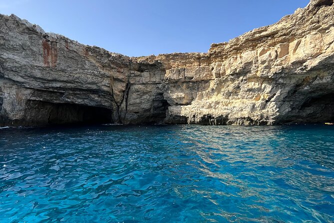 Half day Cruise - Comino, Gozo, Blue & Crystal Lagoon, and Caves - The Boat Ride Perks: Sun Deck Comfort, Drink, and Easy Photo Views