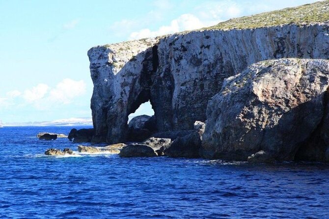 Half Day Malta Tour to Gozo Comino and Blue Lagoon Caves - Santa Marija Bay: Quiet Beach Time, With a Seasonal Catch