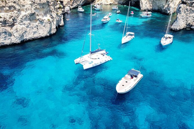Half Day Scenic Catamaran Experience - Blue Lagoon for an hour of swimming, plus beach options