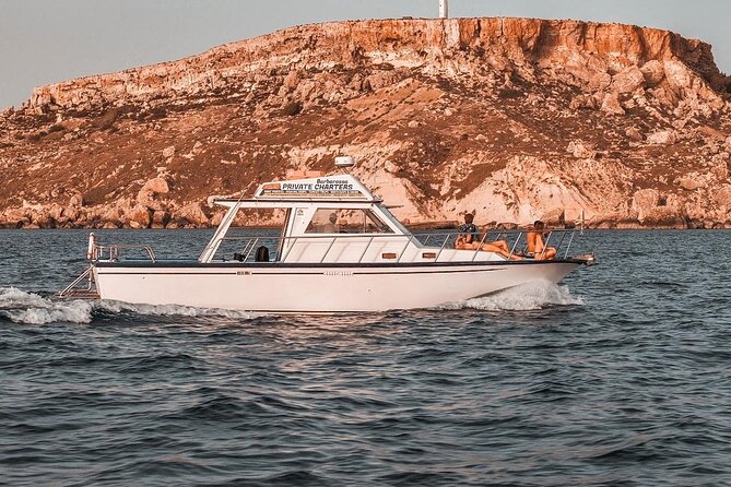 Malta: Around Comino Cruise With Blue Lagoon stop - Stop at Crystal Lagoon: clear water, masks, and an easy hour in the sun