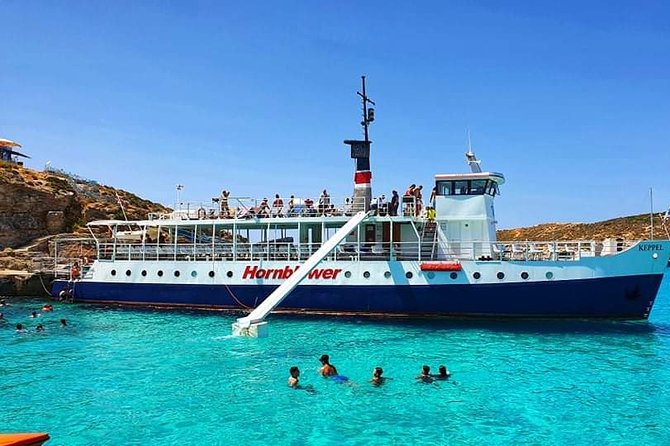 Malta: Comino, Blue Lagoon & Caves - swim, snorkel & slide - Speedboat to the small caves: the optional add-on that can be worth it