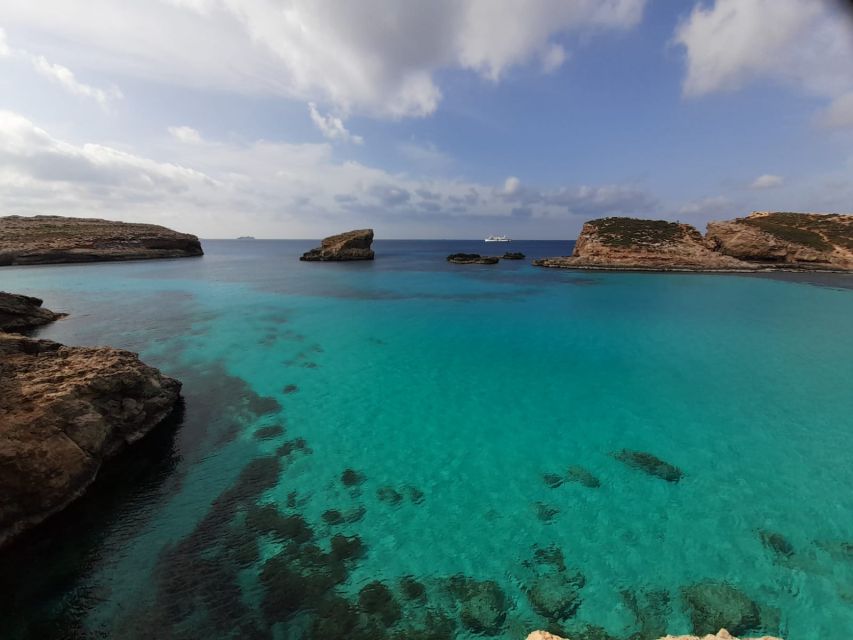 Malta: Comino, Blue lagoon, Crystal Lagoon Private Boat Tour - Crystal Lagoon: cliffs, caves, and another round of clear-water swimming