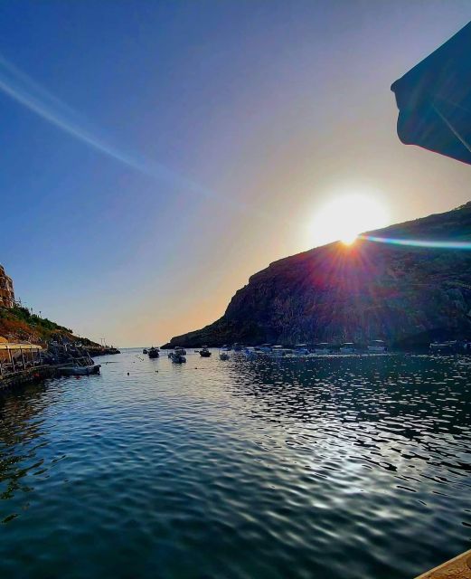 Malta: Gozo and Comino Sunset Tour w/ Blue Lagoon & Transfer - Dwejra Bay golden-hour views, plus the Munxar area viewpoints