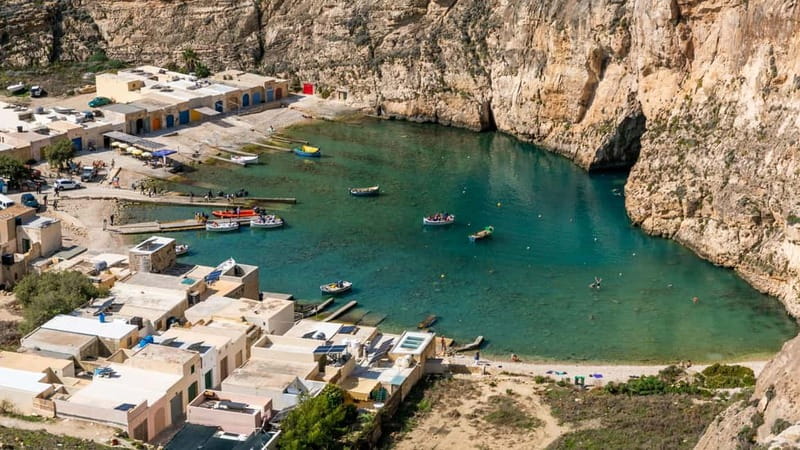 Malta: Gozo Buggy Tour with Lunch, Boat Cruise and Transfers - Getting there and back: ferry, van, and a boat that shows off Comino