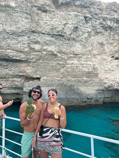 Malta: Gozo, Comino, Blue & Crystal Lagoon, & Caves Cruise - Xlendi Bay, Saint Mary’s Tower, and Crystal Lagoon photo moments on the way back