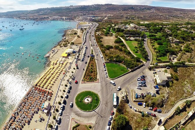Malta: Half-Day Quad Bike Adventure Tour Including Transfers - Armier Bay swim time and the Chapel of Immaculate Conception