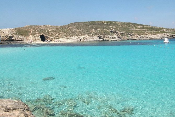 Malta Private Charter from Mellieha: Gozo, Comino, Blue Lagoon - Blue Lagoon, anchored where the water looks unreal