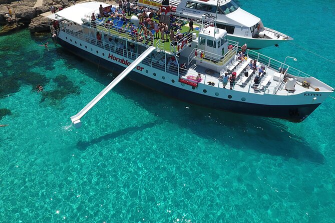 Malta Sunset Boat Tour: Bugibba to Comino Blue Lagoon Cruise - Blue Lagoon for just over two hours: swim, walk, and chill
