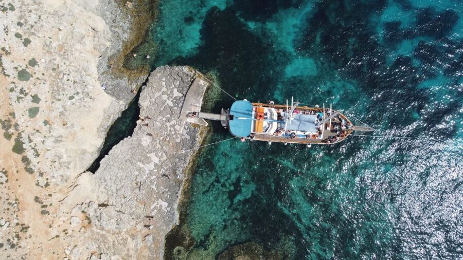 Malta: Sunset Cruise to Blue Lagoon and Caves - The Santa Maria Caves pass on the return