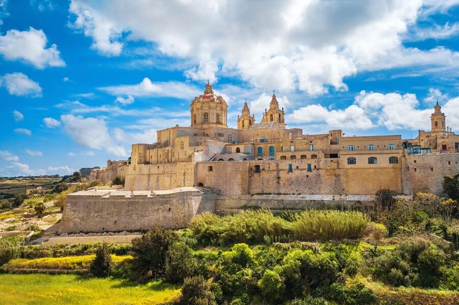 Mdina at Sunset: Small Group Tour of the Ancient city - Entering Mdina Gate for the calm, old-city mood