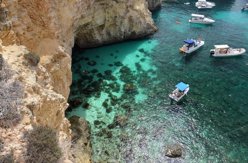 Mellieha: Round Comino, Blue Lagoon & Gozo Cruise with Water - The Blue Lagoon stop: swimming, snorkeling, and the access pass you must plan for