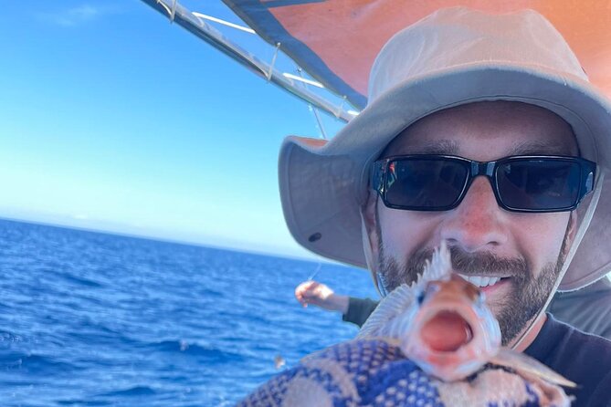 Private Boat charter to Crystal & Blue Lagoon, Caves & Comino - Stop 1: Blue Lagoon swimming and quick Comino tower views