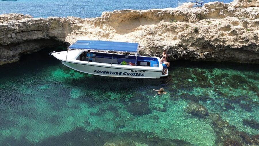 Sliema: Boat Trip to Comino Blue Lagoon, Gozo, and Caves - Halfa Rock in Gozo: Another Clear-Water Moment Before the Caves