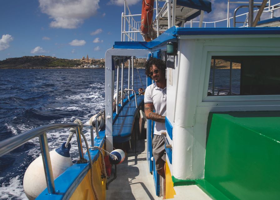 St. Paul's Bay: Gozo, Comino & St. Paul's Bus & Boat Tour - Cave entry along the Maltese coastline, and why weather controls the best options