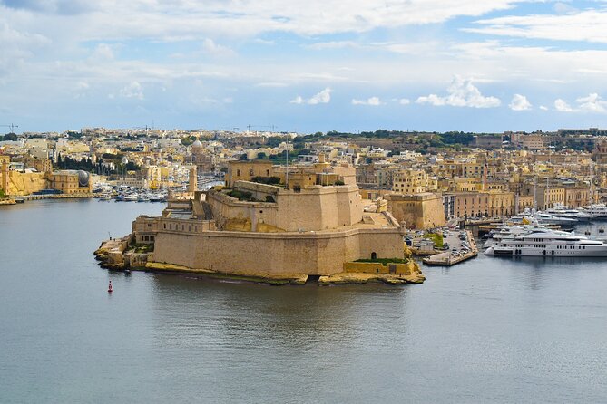 The Grand Tour of Valletta - Merchant Street Market: Where Auberges Meet Everyday City Life