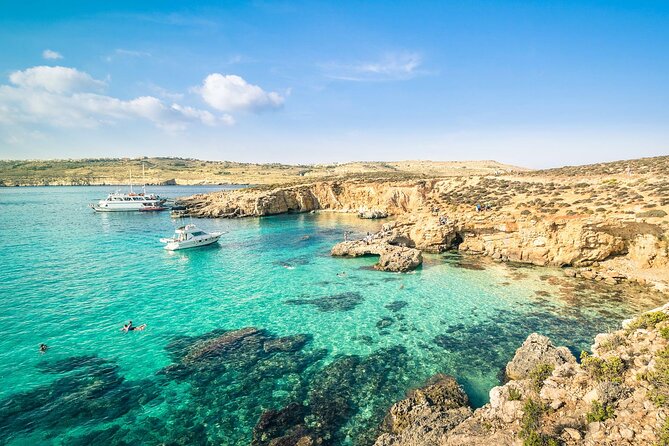 Three Bay Cruise Including Blue Lagoon from Mellieha - Stop 1 Blue Lagoon: the best time to swim, and the access pass you must have