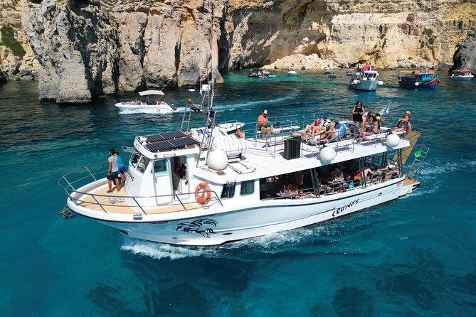 Three Bay Cruise Including Blue Lagoon from Mellieha - Stop 3 Ħalfa Rock Bay in Gozo: quieter water and a pebbly shoreline
