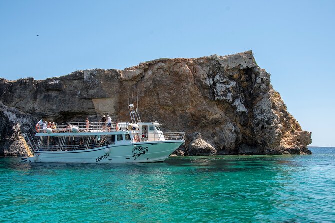 Three Bay Cruise Including Blue Lagoon from Mellieha - Onboard comfort: toilets, shower, and a small cash bar
